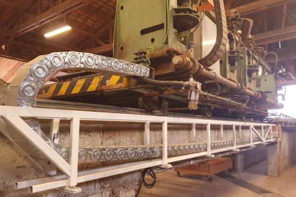INSTALLATION CHAINE A CABLE DANS UNE SCIERIE